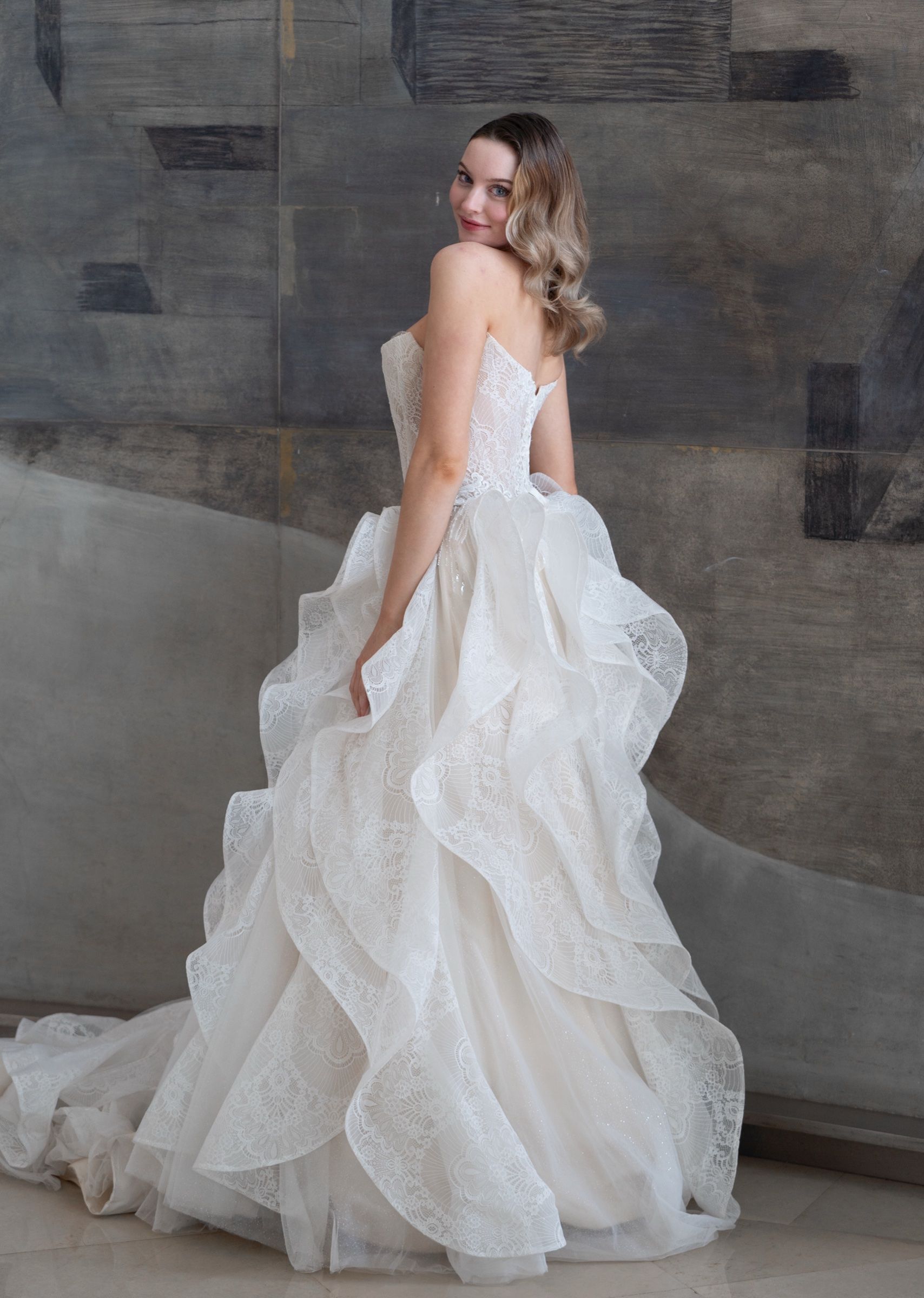 Strapless corset wedding dress with layered organza ruffle skirt — Oksana Dorenska