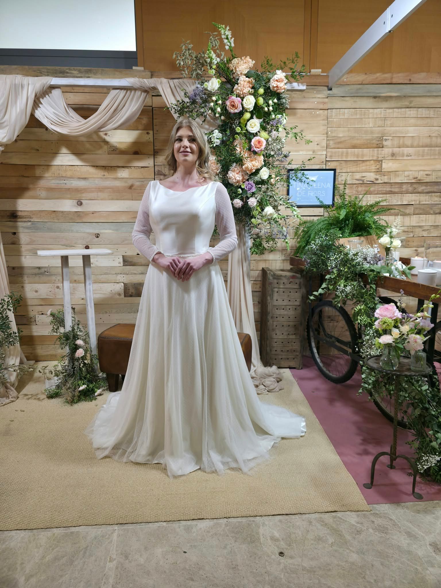 Satin A-line wedding dress with sheer long sleeves, illusion neckline and buttoned back — Oksana Dorenska