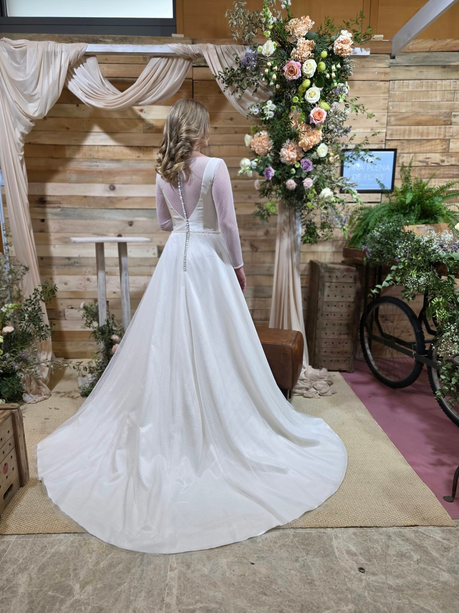 Satin A-line wedding dress with sheer long sleeves, illusion neckline and buttoned back — Oksana Dorenska