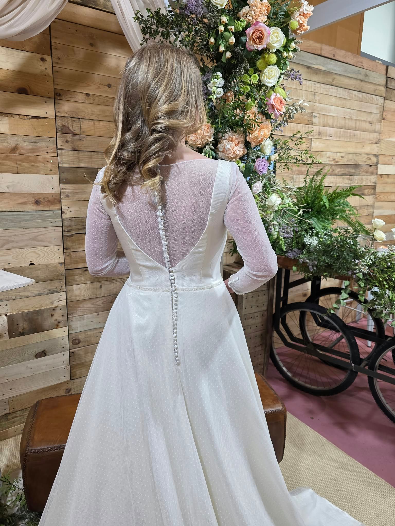 Satin A-line wedding dress with sheer long sleeves, illusion neckline and buttoned back — Oksana Dorenska