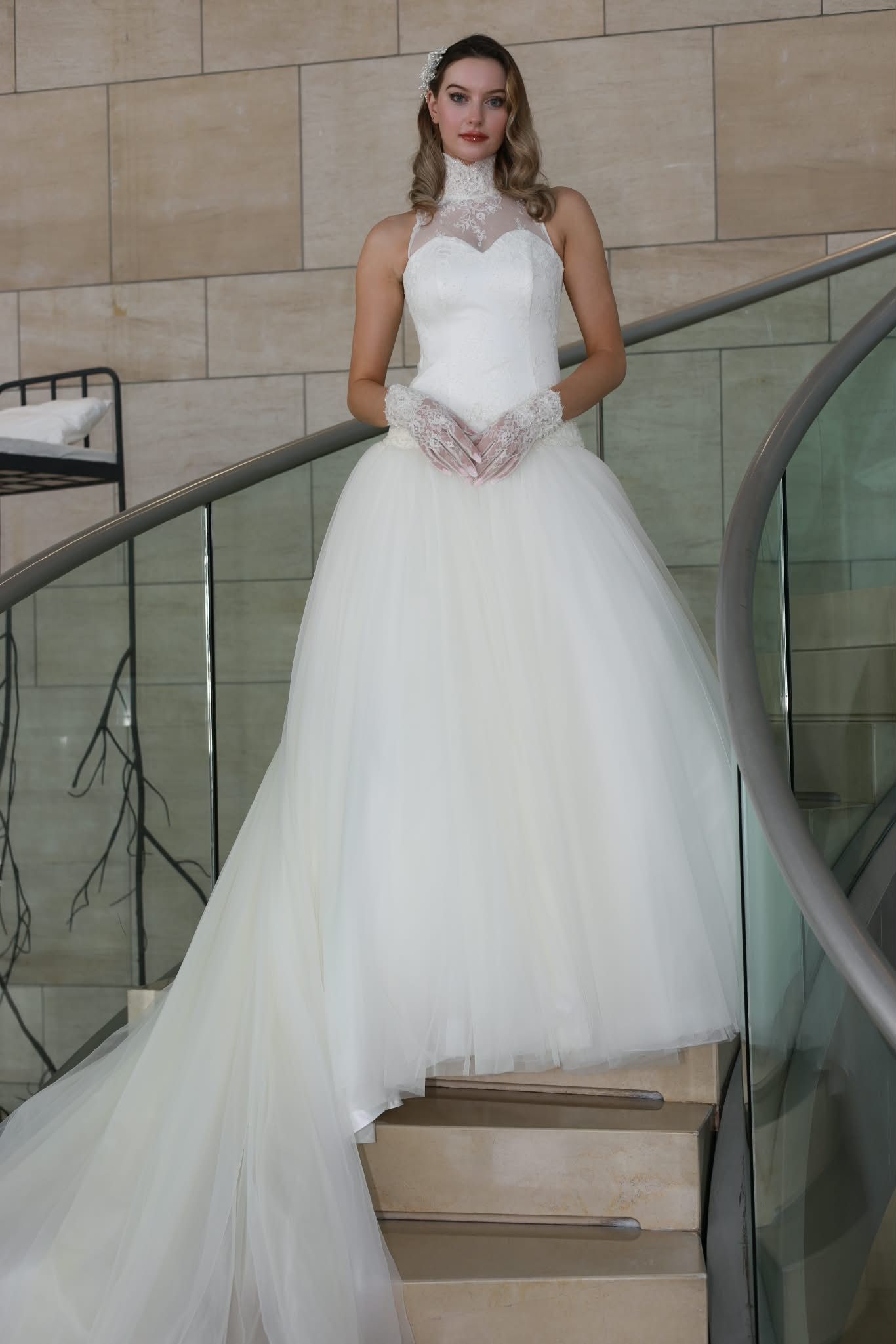High-neck lace wedding dress with tulle skirt and long train — Oksana Dorenska
