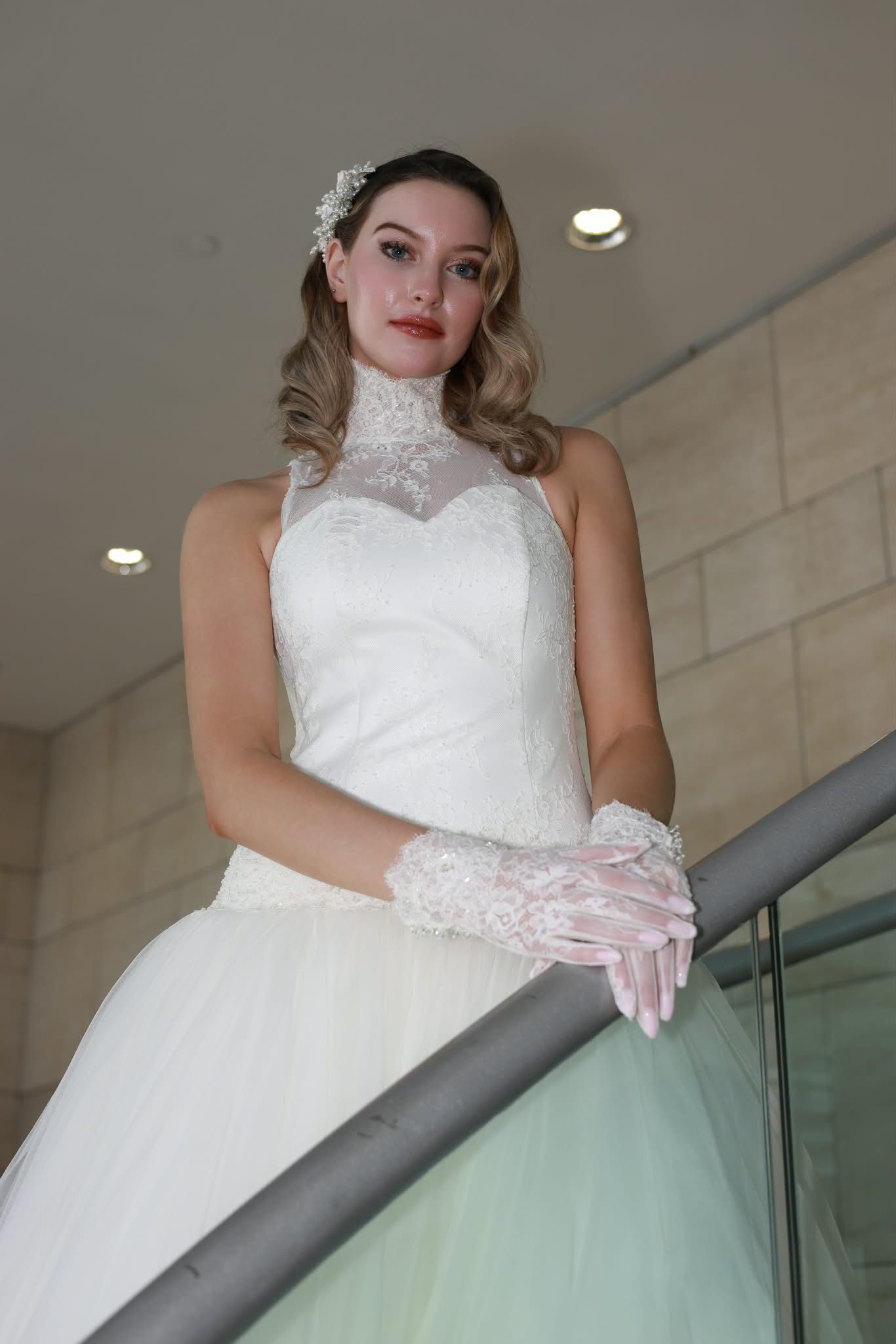 High-neck lace wedding dress with tulle skirt and long train — Oksana Dorenska