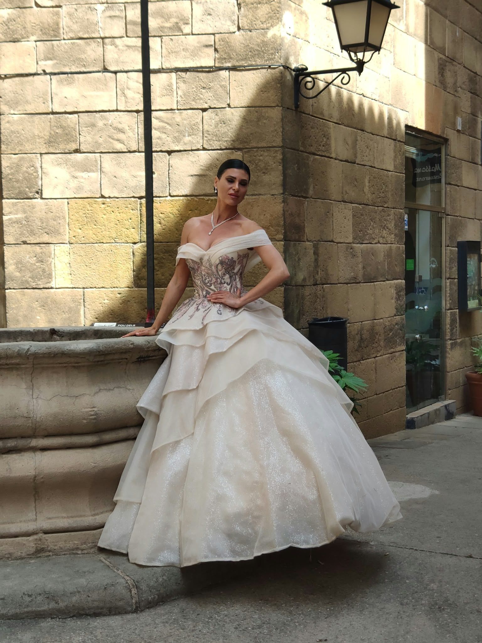Off-shoulder wedding dress with lace corset and champagne ruffle skirt — Oksana Dorenska