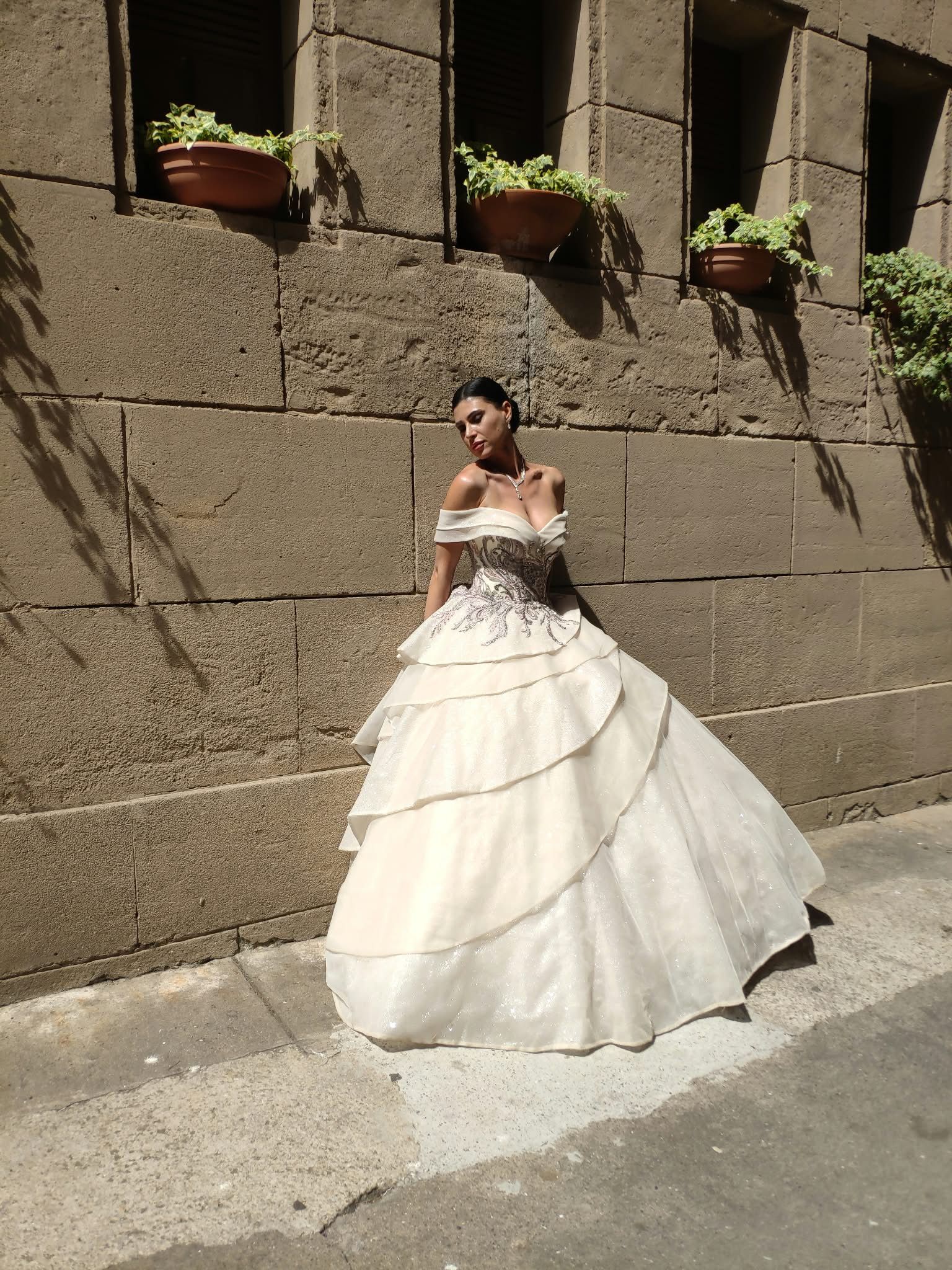 Off-shoulder wedding dress with lace corset and champagne ruffle skirt — Oksana Dorenska