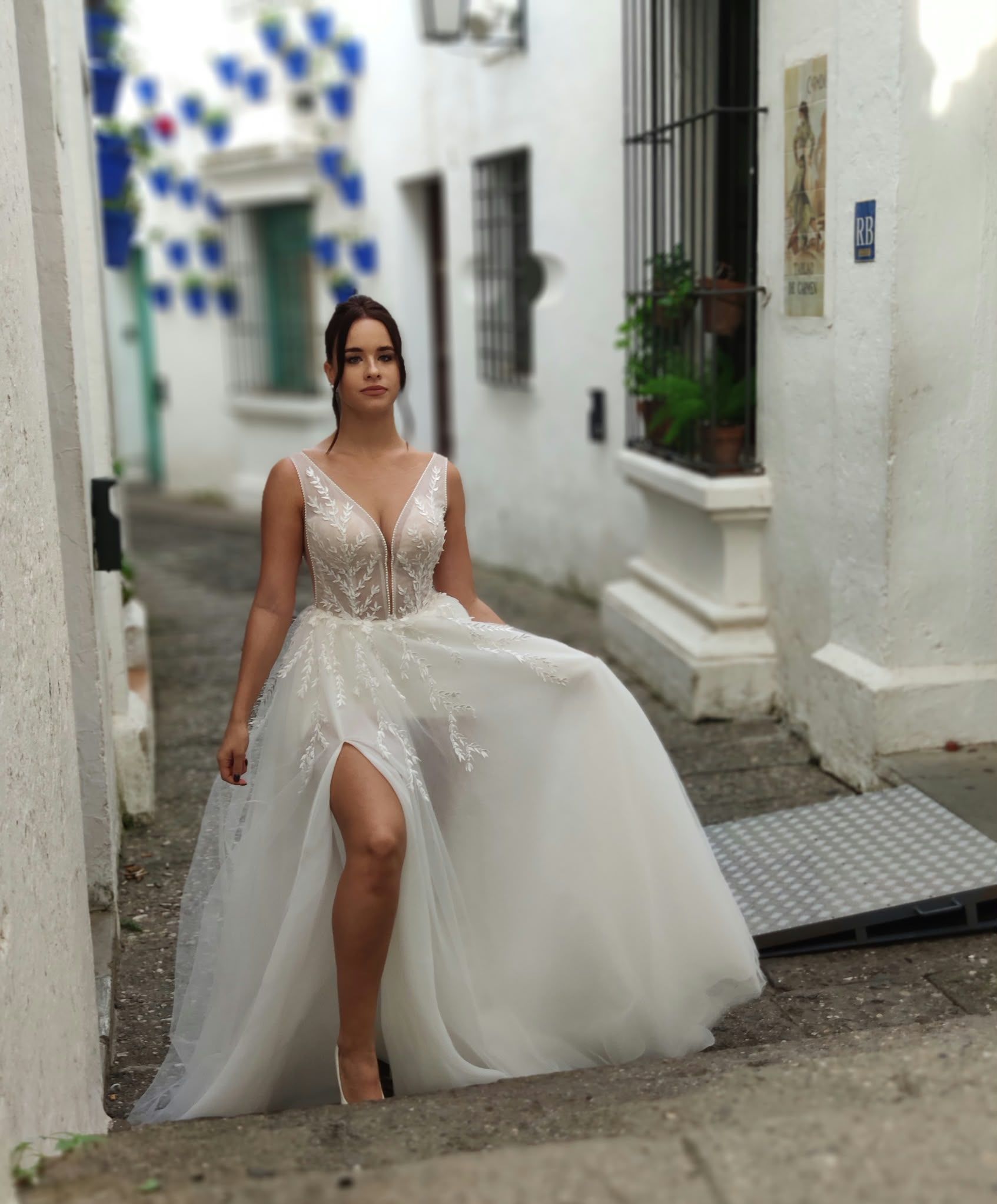 Lace A-line wedding dress with V-neck and skirt slit — Oksana Dorenska