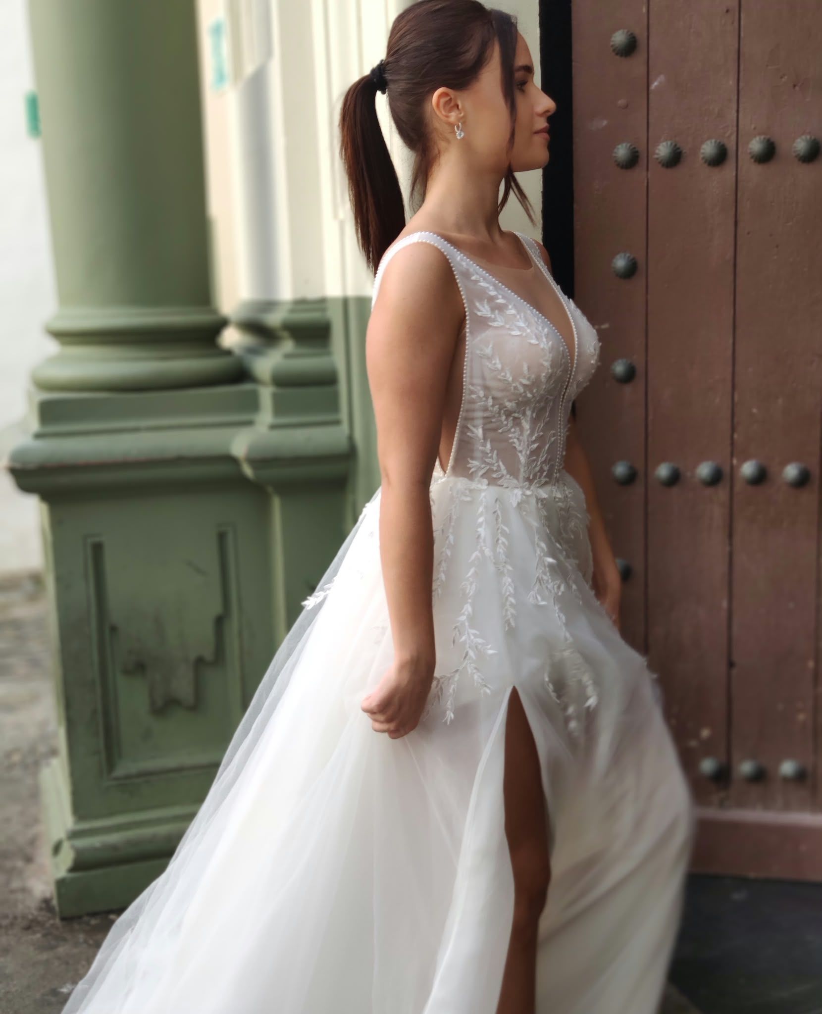 Lace A-line wedding dress with V-neck and skirt slit — Oksana Dorenska