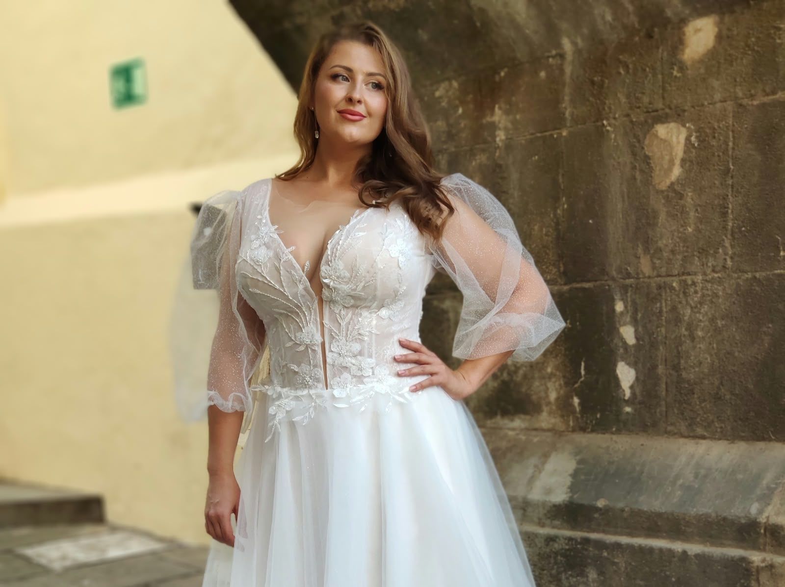 A-line wedding dress with deep V-neck and puffed tulle half sleeves — Oksana Dorenska